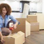 woman packing boxes